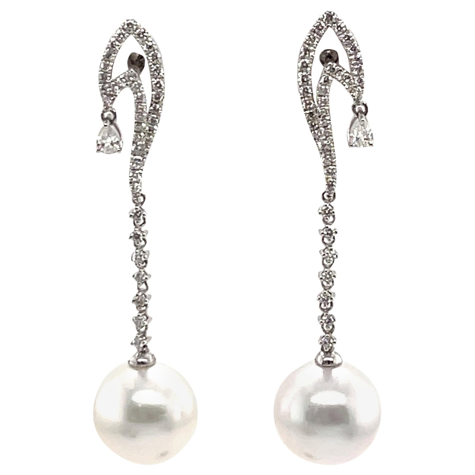Harbor Diamonds 18k White Gold South Sea Pearls Diamond Dangle Earrings: Harbor Diamonds 18k White Gold South Sea Pearls Diamond Dangle Earrings Elevate your elegance with these stunning South Sea Pearls Diamond Dangle Drop Earrings. Crafted from luxurious 18k white gold,