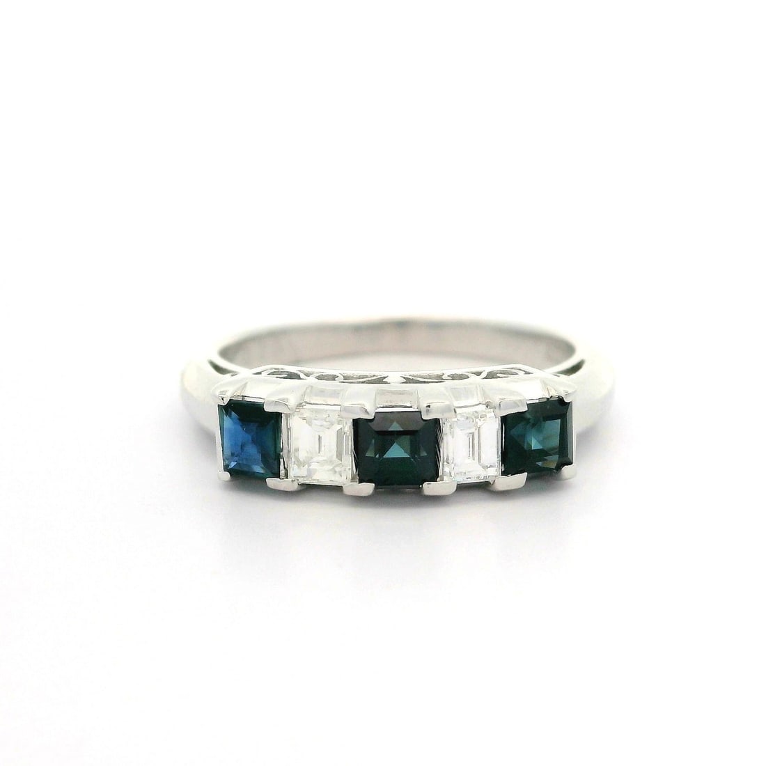 Vintage Platinum 0.98ctw Sapphire Diamond Band Ring 5.5: Vintage Platinum 0.98ctw Sapphire Diamond Band Ring 5.5 This exquisite vintage band ring showcases a stunning combination of natural sapphires and diamonds, elegantly crafted in solid platinum. The ri