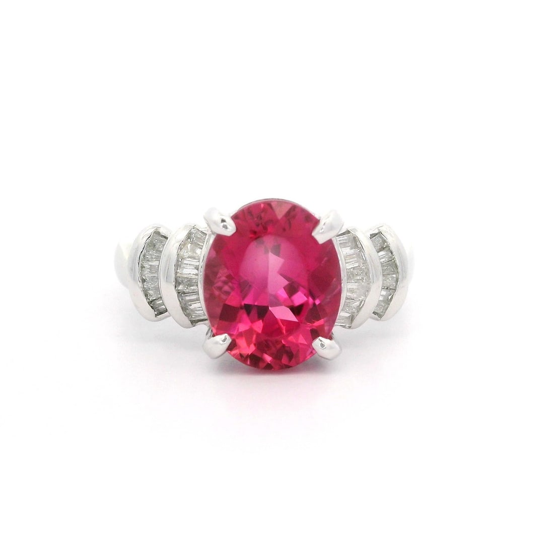 Platinum 2.89ctw Vivid Pink Tourmaline and Diamond Cocktail Ring: Platinum 2.89ctw Vivid Pink Tourmaline and Diamond Cocktail Ring This stunning cocktail ring showcases a vibrant 2.58ct natural pink tourmaline, elegantly set in a prong setting. The oval brilliant cu