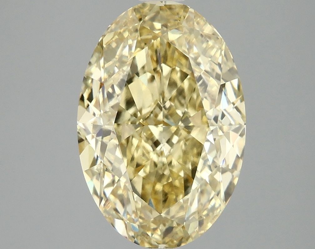 Loose Diamond - OVAL 4.02ct Fancy Vivid Yellow VS1: Loose Diamond - OVAL 4.02ct Fancy Vivid Yellow VS1 Source: This is a real non-mined Diamond that has been grown in a lab Shape: OVAL Carats: 4.02 Color: Fancy Vivid Yellow Certification: IGI Video: