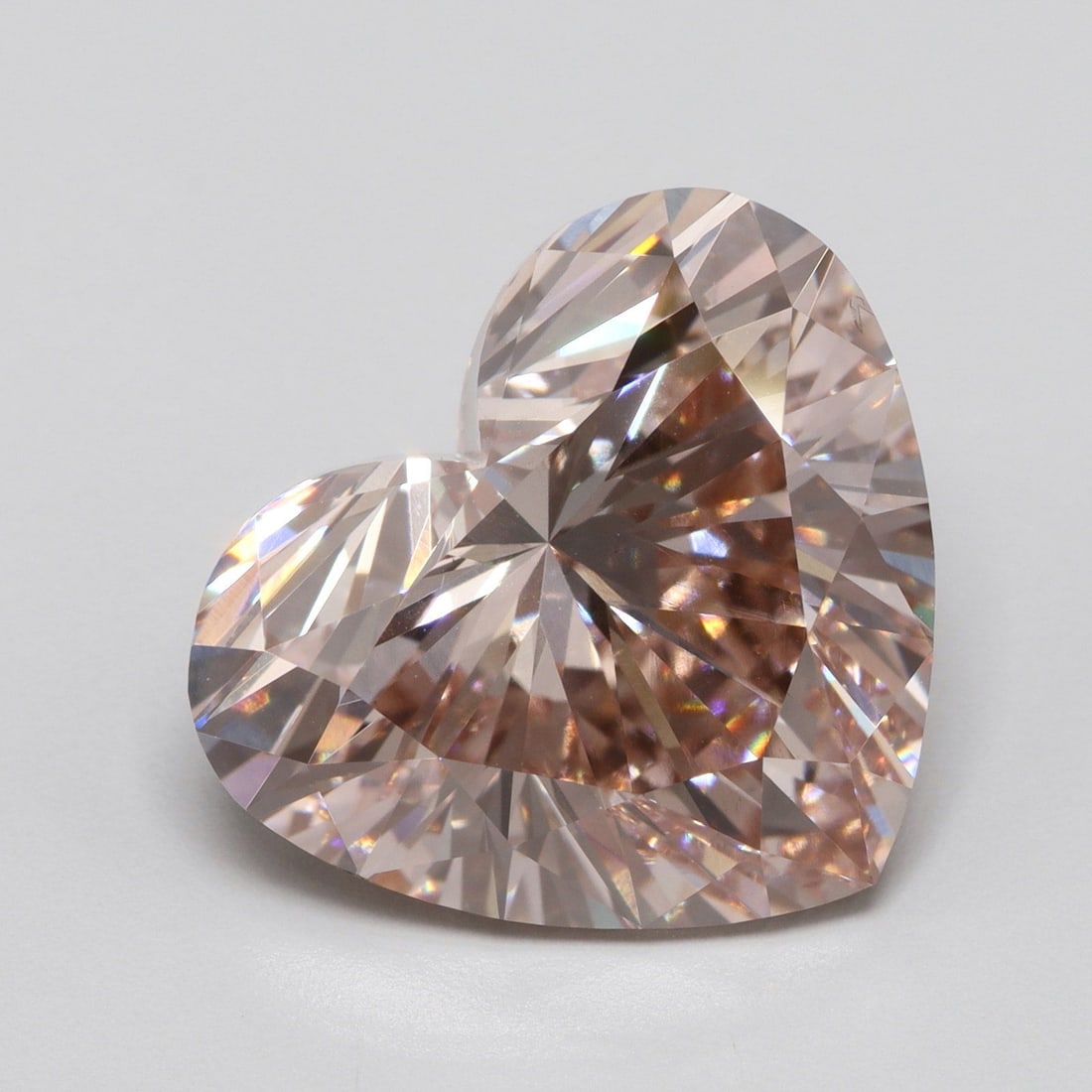 Loose Diamond - HEART 5.01ct Fancy Intense Brownish Pink VS1: Loose Diamond - HEART 5.01ct Fancy Intense Brownish Pink VS1 Source: This is a real non-mined Diamond that has been grown in a lab Shape: HEART Carats: 5.01 Color: Fancy Intense Brownish Pink Certific
