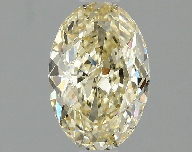 Loose Diamond - OVAL 1.46ct Fancy Intense Yellow VS2: Loose Diamond - OVAL 1.46ct Fancy Intense Yellow VS2 Source: This is a real non-mined Diamond that has been grown in a lab Shape: OVAL Carats: 1.46 Color: Fancy Intense Yellow Certification: IGI Video