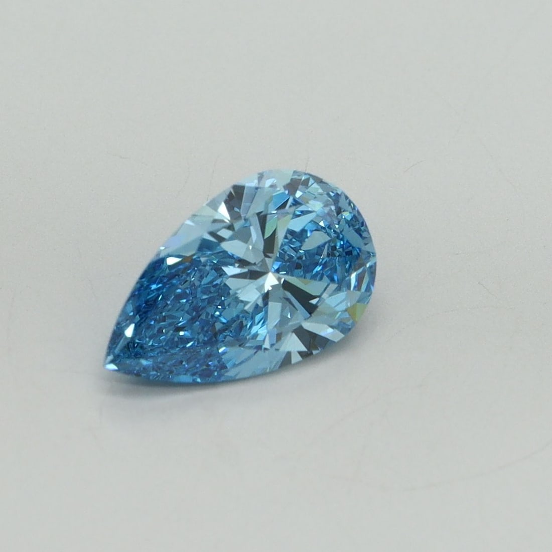Loose Diamond - PEAR 1.17ct Fancy Vivid Blue VS1: Loose Diamond - PEAR 1.17ct Fancy Vivid Blue VS1 Source: This is a real non-mined Diamond that has been grown in a lab Shape: PEAR Carats: 1.17 Color: Fancy Vivid Blue Certification: IGI Video: