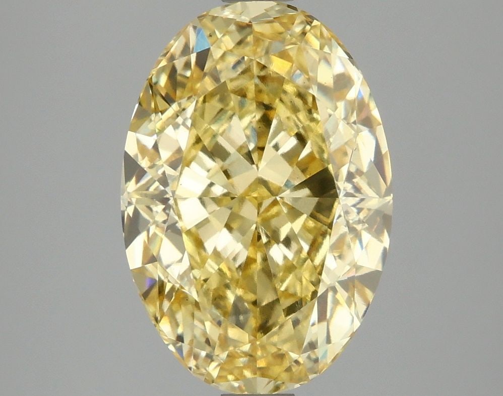 Loose Diamond - OVAL 4.01ct Fancy Vivid Yellow VS1: Loose Diamond - OVAL 4.01ct Fancy Vivid Yellow VS1 Source: This is a real non-mined Diamond that has been grown in a lab Shape: OVAL Carats: 4.01 Color: Fancy Vivid Yellow Certification: IGI Video: