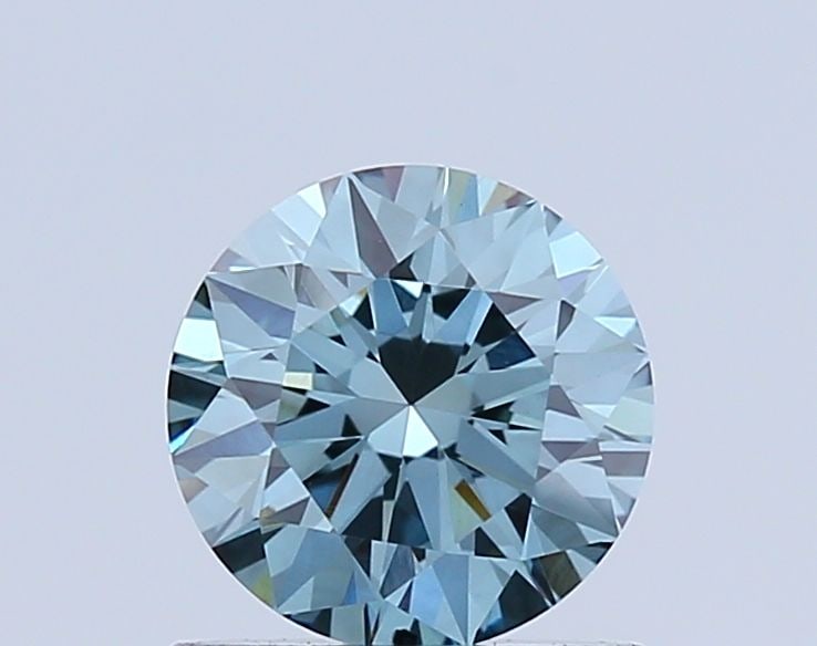 Loose Diamond - ROUND 0.8ct Fancy Vivid Blue VVS2: Loose Diamond - ROUND 0.8ct Fancy Vivid Blue VVS2 Source: This is a real non-mined Diamond that has been grown in a lab Shape: ROUND Carats: 0.8 Color: Fancy Vivid Blue Certification: NONE Video: