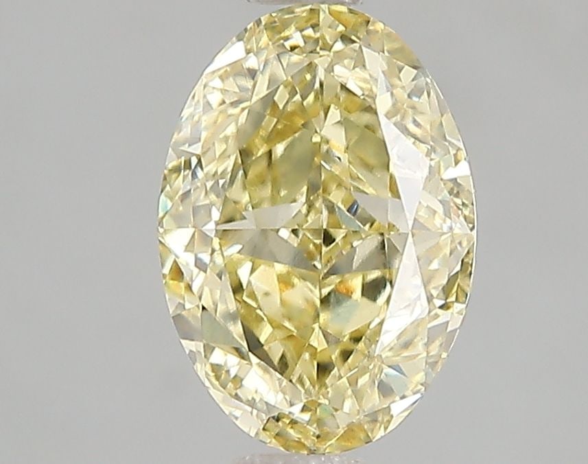 Loose Diamond - OVAL 2.05ct Fancy Intense Yellow VS2: Loose Diamond - OVAL 2.05ct Fancy Intense Yellow VS2 Source: This is a real non-mined Diamond that has been grown in a lab Shape: OVAL Carats: 2.05 Color: Fancy Intense Yellow Certification: IGI Video