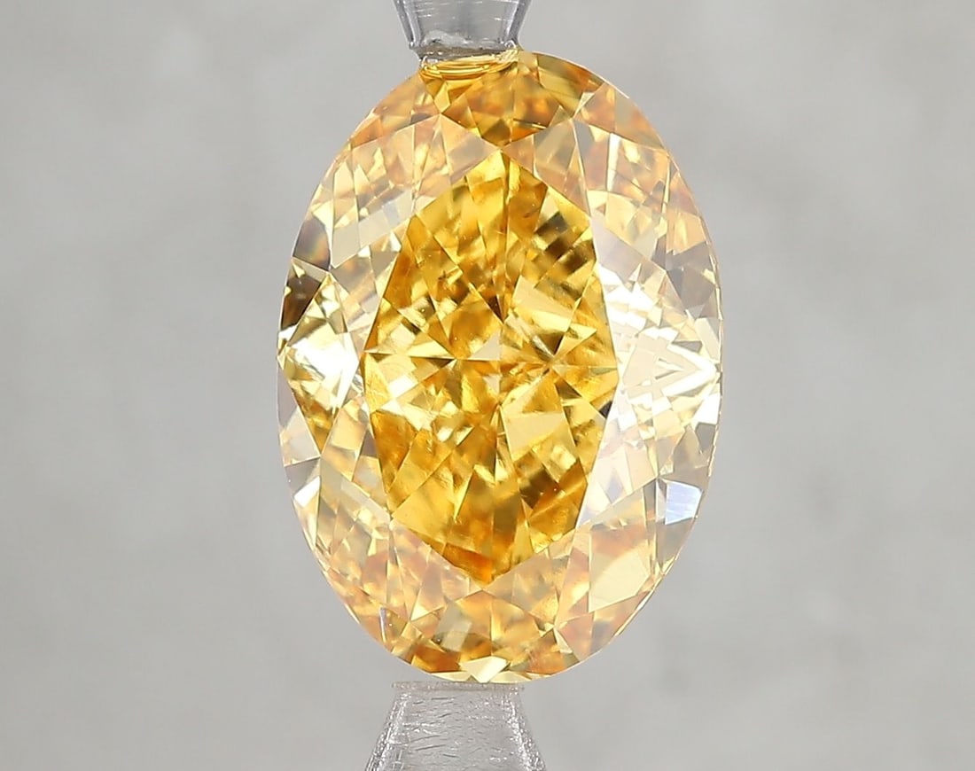 Loose Diamond - OVAL 5.13ct Fancy Vivid Yellow VS2: Loose Diamond - OVAL 5.13ct Fancy Vivid Yellow VS2 Source: This is a real non-mined Diamond that has been grown in a lab Shape: OVAL Carats: 5.13 Color: Fancy Vivid Yellow Certification: IGI Video: