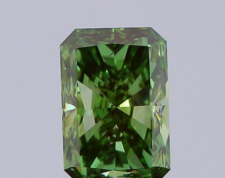 Loose Diamond - RADIANT 0.99ct Fancy Vivid Green VS2: Loose Diamond - RADIANT 0.99ct Fancy Vivid Green VS2 Source: This is a real non-mined Diamond that has been grown in a lab Shape: RADIANT Carats: 0.99 Color: Fancy Vivid Green Certification: IGI Video