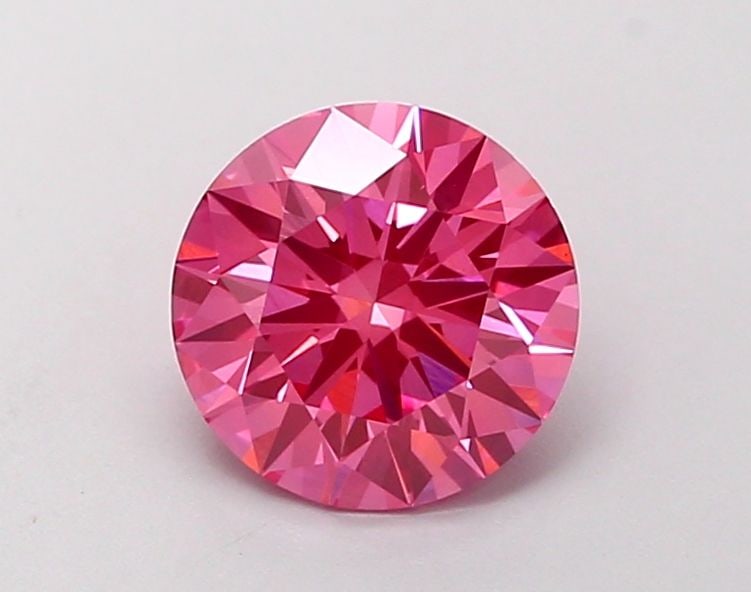 Ideal Loose Diamond - ROUND 1.38ct Fancy Vivid Pink VVS2: Ideal Loose Diamond - ROUND 1.38ct Fancy Vivid Pink VVS2 Source: This is a real non-mined Diamond that has been grown in a lab Shape: ROUND Carats: 1.38 Color: Fancy Vivid Pink Certification: IGI Vide