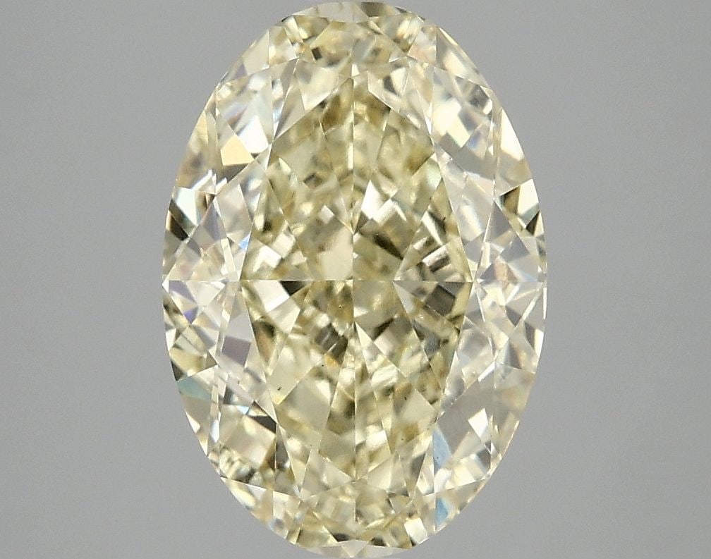 Loose Diamond - OVAL 4.03ct Fancy Vivid Yellow VS1: Loose Diamond - OVAL 4.03ct Fancy Vivid Yellow VS1 Source: This is a real non-mined Diamond that has been grown in a lab Shape: OVAL Carats: 4.03 Color: Fancy Vivid Yellow Certification: IGI Video: