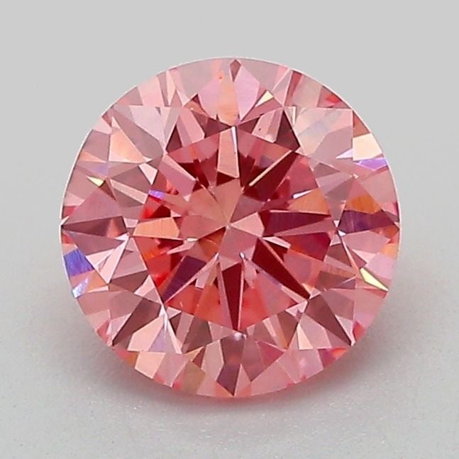 Loose Diamond - ROUND 1.22ct Fancy Vivid Pink VS1: Loose Diamond - ROUND 1.22ct Fancy Vivid Pink VS1 Source: This is a real non-mined Diamond that has been grown in a lab Shape: ROUND Carats: 1.22 Color: Fancy Vivid Pink Certification: IGI Video: