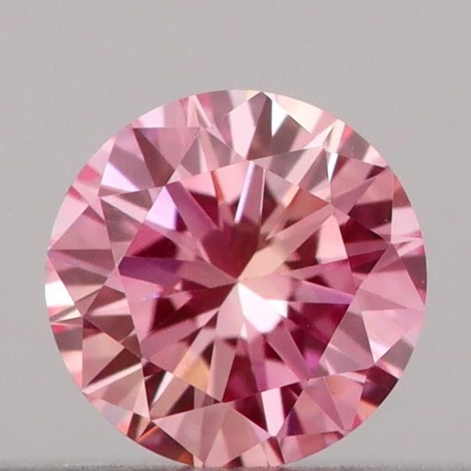 Loose Diamond - ROUND 0.16ct Fancy Vivid Pink VVS2: Loose Diamond - ROUND 0.16ct Fancy Vivid Pink VVS2 Source: This is a real non-mined Diamond that has been grown in a lab Shape: ROUND Carats: 0.16 Color: Fancy Vivid Pink Certification: IGI Video: