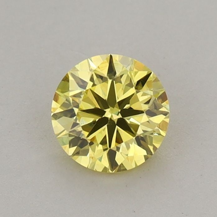 Loose Diamond - ROUND 0.56ct Fancy Vivid Yellow VS1: Loose Diamond - ROUND 0.56ct Fancy Vivid Yellow VS1 Source: This is a real non-mined Diamond that has been grown in a lab Shape: ROUND Carats: 0.56 Color: Fancy Vivid Yellow Certification: IGI Video: