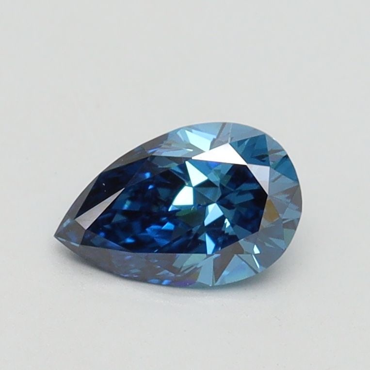 Loose Diamond - PEAR 0.54ct Fancy Vivid Blue VVS2: Loose Diamond - PEAR 0.54ct Fancy Vivid Blue VVS2 Source: This is a real non-mined Diamond that has been grown in a lab Shape: PEAR Carats: 0.54 Color: Fancy Vivid Blue Certification: IGI Video: