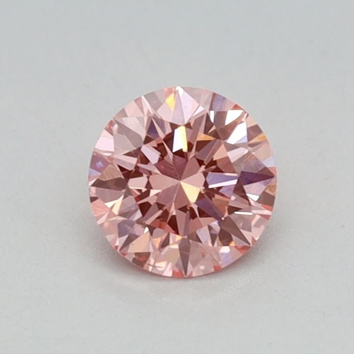 Loose Diamond - ROUND 0.31ct Fancy Vivid Pink VS2: Loose Diamond - ROUND 0.31ct Fancy Vivid Pink VS2 Source: This is a real non-mined Diamond that has been grown in a lab Shape: ROUND Carats: 0.31 Color: Fancy Vivid Pink Certification: IGI Video: