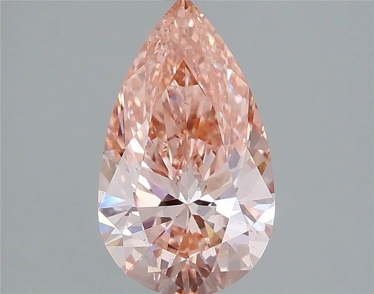 Loose Diamond - PEAR 2.01ct Fancy Vivid Pink VS2: Loose Diamond - PEAR 2.01ct Fancy Vivid Pink VS2 Source: This is a real non-mined Diamond that has been grown in a lab Shape: PEAR Carats: 2.01 Color: Fancy Vivid Pink Certification: IGI Video: