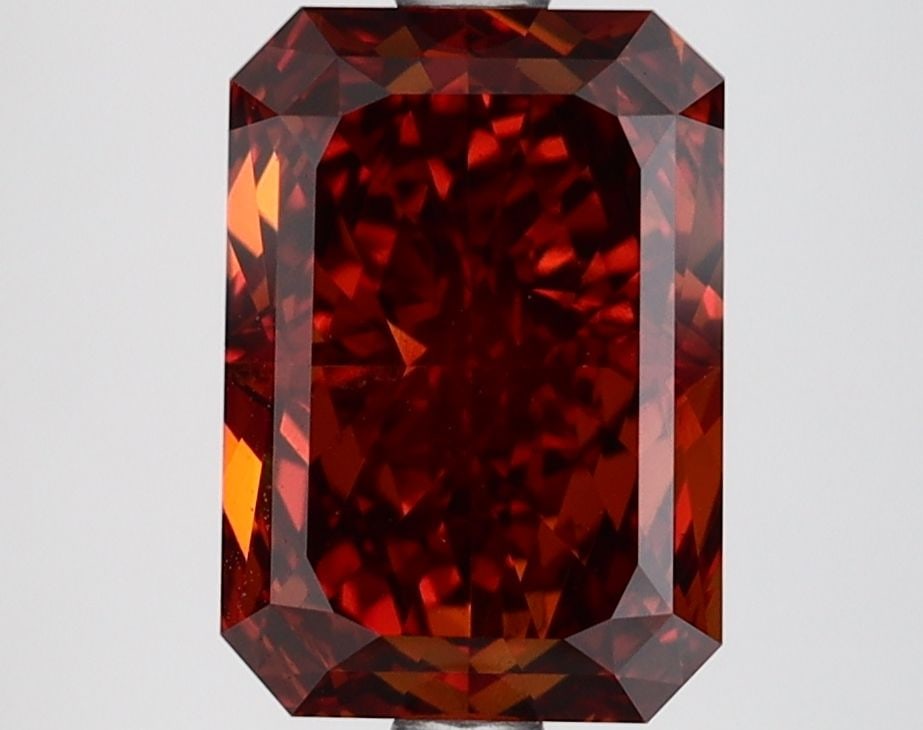 Loose Diamond - RADIANT 3.05ct Fancy Orange VS1: Loose Diamond - RADIANT 3.05ct Fancy Orange VS1 Source: This is a real non-mined Diamond that has been grown in a lab Shape: RADIANT Carats: 3.05 Color: Fancy Orange Certification: IGI Video: