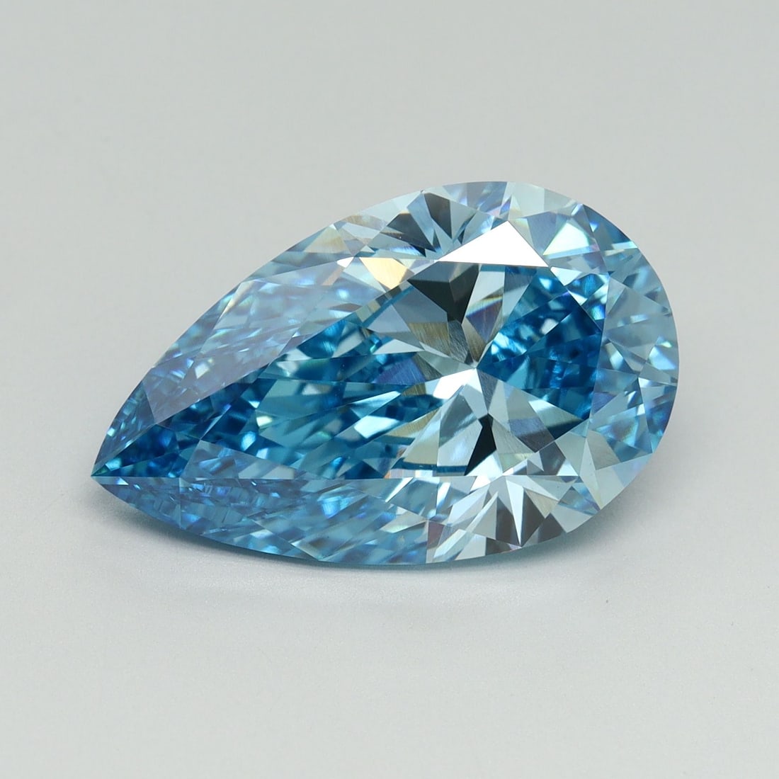 Loose Diamond - PEAR 7.19ct Fancy Vivid Blue VS1: Loose Diamond - PEAR 7.19ct Fancy Vivid Blue VS1 Source: This is a real non-mined Diamond that has been grown in a lab Shape: PEAR Carats: 7.19 Color: Fancy Vivid Blue Certification: IGI Video: