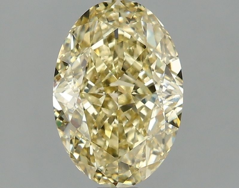 Loose Diamond - OVAL 2.1ct Fancy Intense Yellow VS1: Loose Diamond - OVAL 2.1ct Fancy Intense Yellow VS1 Source: This is a real non-mined Diamond that has been grown in a lab Shape: OVAL Carats: 2.1 Color: Fancy Intense Yellow Certification: IGI Video: