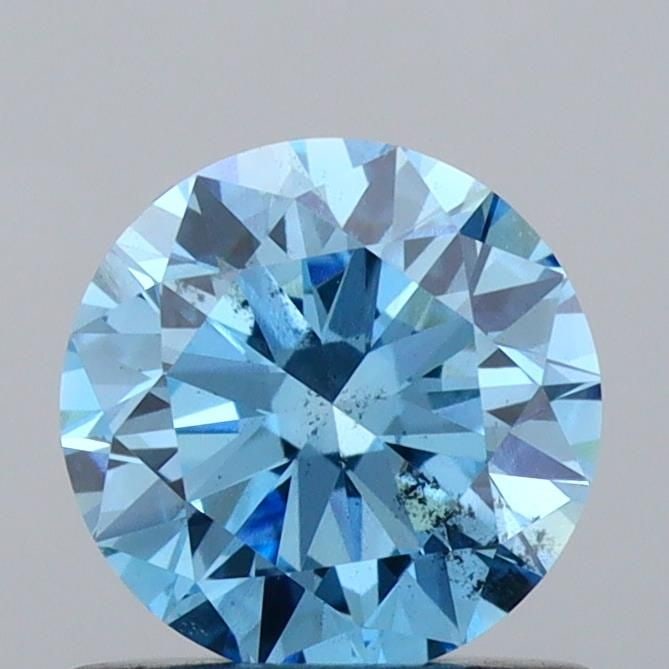 Loose Diamond - ROUND 0.72ct Fancy Vivid Blue SI2: Loose Diamond - ROUND 0.72ct Fancy Vivid Blue SI2 Source: This is a real non-mined Diamond that has been grown in a lab Shape: ROUND Carats: 0.72 Color: Fancy Vivid Blue Certification: IGI Video:
