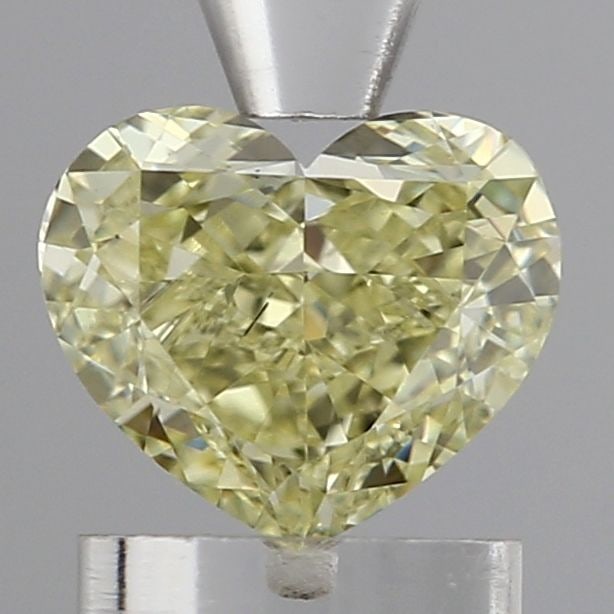 Loose Diamond - HEART 1.16ct Fancy Yellow VS2: Loose Diamond - HEART 1.16ct Fancy Yellow VS2 Source: This is a real non-mined Diamond that has been grown in a lab Shape: HEART Carats: 1.16 Color: Fancy Yellow Certification: IGI Video: