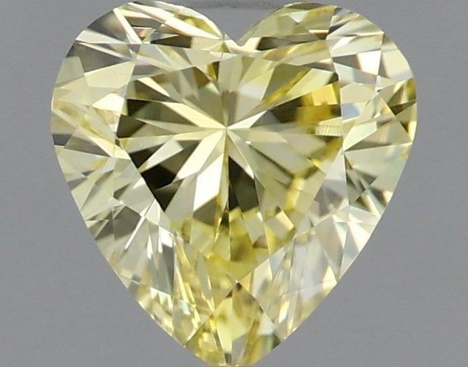 Loose Diamond - HEART 0.5ct Fancy Intense Yellow VVS2: Loose Diamond - HEART 0.5ct Fancy Intense Yellow VVS2 Source: This is a real non-mined Diamond that has been grown in a lab Shape: HEART Carats: 0.5 Color: Fancy Intense Yellow Certification: IGI PLEA