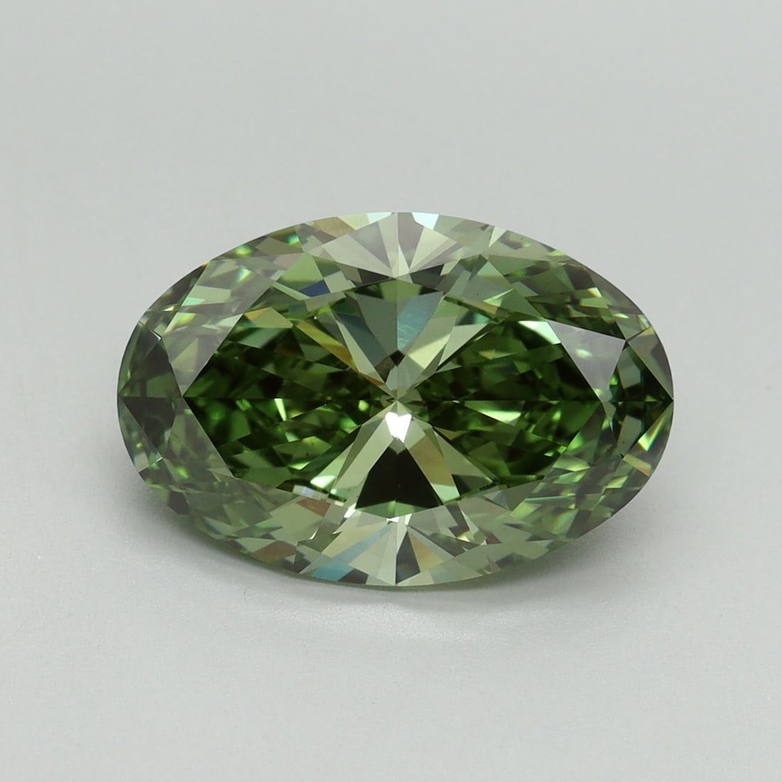 Loose Diamond - OVAL 4.14ct Fancy Vivid Green VS1: Loose Diamond - OVAL 4.14ct Fancy Vivid Green VS1 Source: This is a real non-mined Diamond that has been grown in a lab Shape: OVAL Carats: 4.14 Color: Fancy Vivid Green Certification: IGI Video: