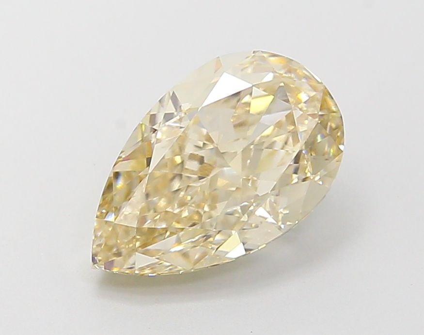 Loose Diamond - PEAR 2.11ct Fancy Light Brownish Yellow VS1: Loose Diamond - PEAR 2.11ct Fancy Light Brownish Yellow VS1 Source: This is a real non-mined Diamond that has been grown in a lab Shape: PEAR Carats: 2.11 Color: Fancy Light Brownish Yellow Certificat