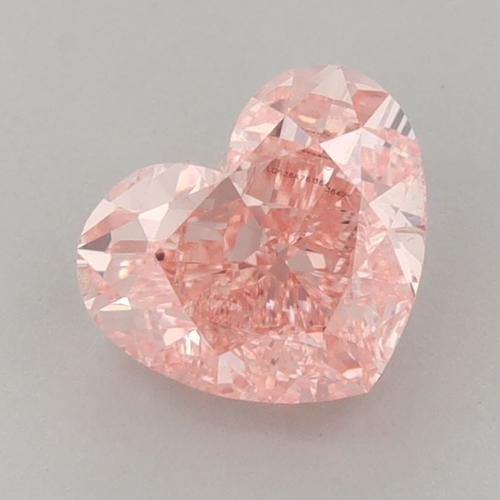 Loose Diamond - HEART 1.73ct Fancy Vivid Pink VVS2: Loose Diamond - HEART 1.73ct Fancy Vivid Pink VVS2 Source: This is a real non-mined Diamond that has been grown in a lab Shape: HEART Carats: 1.73 Color: Fancy Vivid Pink Certification: IGI Video: