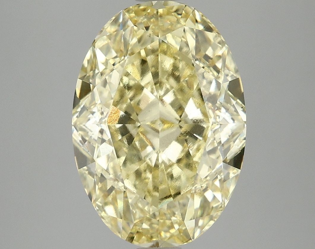 Loose Diamond - OVAL 5.07ct Fancy Intense Yellow VS1: Loose Diamond - OVAL 5.07ct Fancy Intense Yellow VS1 Source: This is a real non-mined Diamond that has been grown in a lab Shape: OVAL Carats: 5.07 Color: Fancy Intense Yellow Certification: IGI Video
