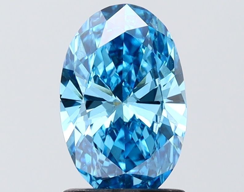 Loose Diamond - OVAL 1.28ct Fancy Vivid Blue VS1: Loose Diamond - OVAL 1.28ct Fancy Vivid Blue VS1 Source: This is a real non-mined Diamond that has been grown in a lab Shape: OVAL Carats: 1.28 Color: Fancy Vivid Blue Certification: IGI Video: