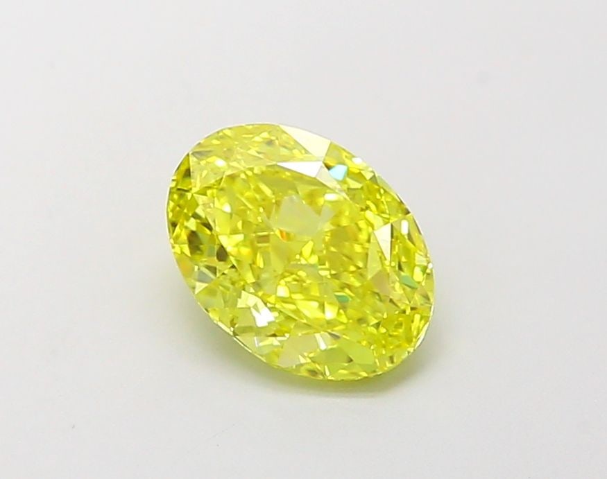 Loose Diamond - OVAL 1.08ct Fancy Vivid Yellow VVS1: Loose Diamond - OVAL 1.08ct Fancy Vivid Yellow VVS1 Source: This is a real non-mined Diamond that has been grown in a lab Shape: OVAL Carats: 1.08 Color: Fancy Vivid Yellow Certification: IGI Video: