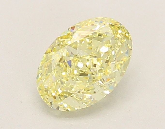 Loose Diamond - OVAL 1.02ct Fancy Light Yellow VS1: Loose Diamond - OVAL 1.02ct Fancy Light Yellow VS1 Source: This is a real non-mined Diamond that has been grown in a lab Shape: OVAL Carats: 1.02 Color: Fancy Light Yellow Certification: IGI Video: