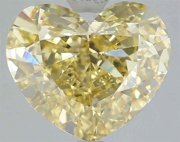 Loose Diamond - HEART 5.54ct Fancy Intense Yellow VS1: Loose Diamond - HEART 5.54ct Fancy Intense Yellow VS1 Source: This is a real non-mined Diamond that has been grown in a lab Shape: HEART Carats: 5.54 Color: Fancy Intense Yellow Certification: IGI Vid