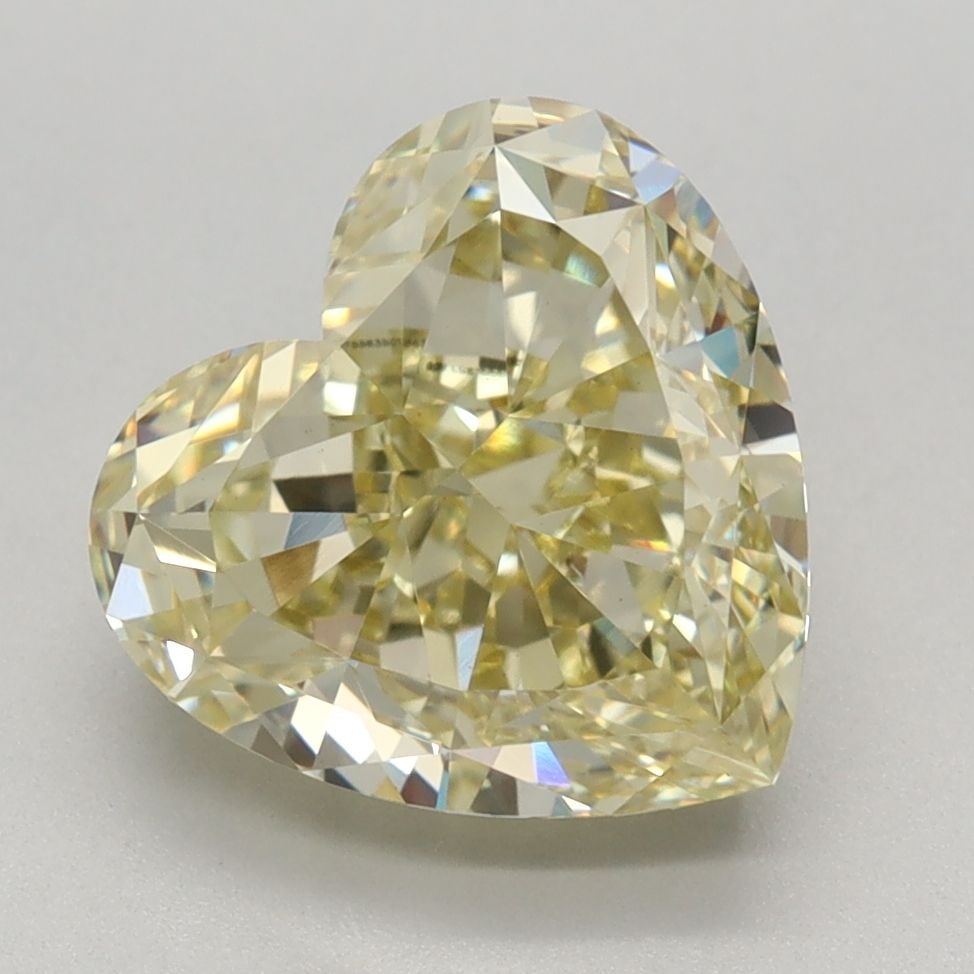 Loose Diamond - HEART 3.09ct Fancy Yellow VS1: Loose Diamond - HEART 3.09ct Fancy Yellow VS1 Source: This is a real non-mined Diamond that has been grown in a lab Shape: HEART Carats: 3.09 Color: Fancy Yellow Certification: IGI Video: