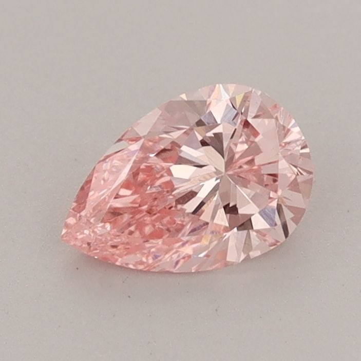 Loose Diamond - PEAR 0.59ct Fancy Vivid Pink VVS2: Loose Diamond - PEAR 0.59ct Fancy Vivid Pink VVS2 Source: This is a real non-mined Diamond that has been grown in a lab Shape: PEAR Carats: 0.59 Color: Fancy Vivid Pink Certification: IGI Video: