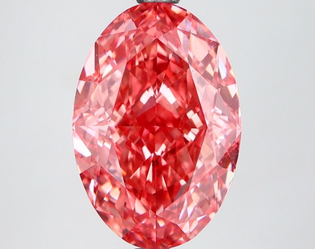 Loose Diamond - OVAL 4.19ct Fancy Vivid Pink VS1: Loose Diamond - OVAL 4.19ct Fancy Vivid Pink VS1 Source: This is a real non-mined Diamond that has been grown in a lab Shape: OVAL Carats: 4.19 Color: Fancy Vivid Pink Certification: IGI Video:
