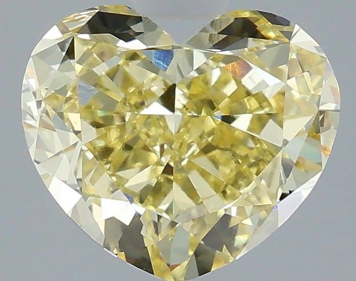 Loose Diamond - HEART 3.04ct Fancy Yellow VS1: Loose Diamond - HEART 3.04ct Fancy Yellow VS1 Source: This is a real non-mined Diamond that has been grown in a lab Shape: HEART Carats: 3.04 Color: Fancy Yellow Certification: IGI Video: