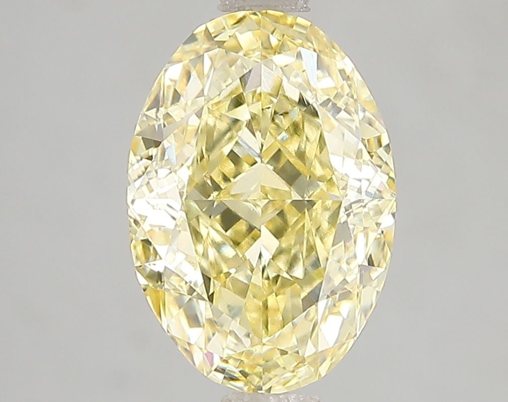 Loose Diamond - OVAL 3.06ct Fancy Vivid Yellow VS1: Loose Diamond - OVAL 3.06ct Fancy Vivid Yellow VS1 Source: This is a real non-mined Diamond that has been grown in a lab Shape: OVAL Carats: 3.06 Color: Fancy Vivid Yellow Certification: IGI Video: