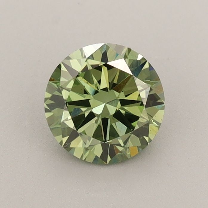 Loose Diamond - ROUND 0.69ct Fancy Vivid Green VVS2: Loose Diamond - ROUND 0.69ct Fancy Vivid Green VVS2 Source: This is a real non-mined Diamond that has been grown in a lab Shape: ROUND Carats: 0.69 Color: Fancy Vivid Green Certification: IGI Video:
