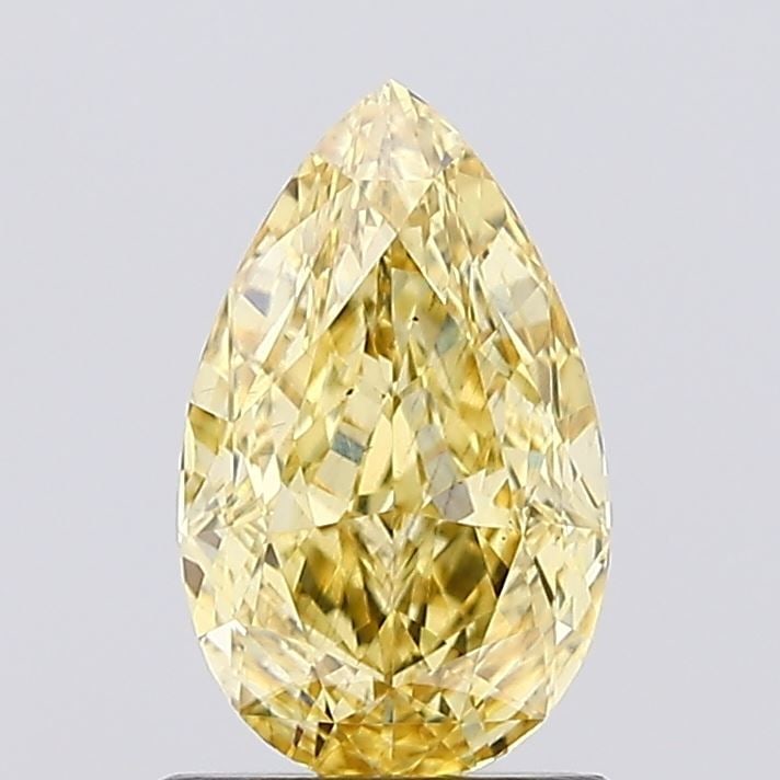 Loose Diamond - PEAR 1.11ct Fancy Vivid Yellow VS2: Loose Diamond - PEAR 1.11ct Fancy Vivid Yellow VS2 Source: This is a real non-mined Diamond that has been grown in a lab Shape: PEAR Carats: 1.11 Color: Fancy Vivid Yellow Certification: IGI Video: