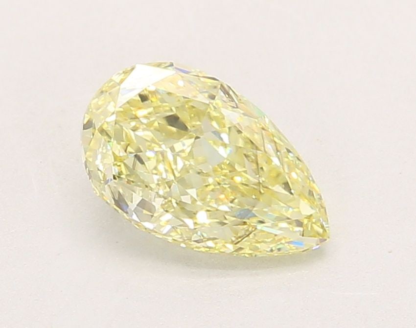Loose Diamond - PEAR 1.52ct Fancy Yellow VS2: Loose Diamond - PEAR 1.52ct Fancy Yellow VS2 Source: This is a real non-mined Diamond that has been grown in a lab Shape: PEAR Carats: 1.52 Color: Fancy Yellow Certification: IGI Video: