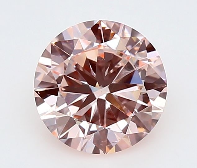 Loose Diamond - ROUND 0.92ct Fancy Pink VS2: Loose Diamond - ROUND 0.92ct Fancy Pink VS2 Source: This is a real non-mined Diamond that has been grown in a lab Shape: ROUND Carats: 0.92 Color: Fancy Pink Certification: IGI Video: