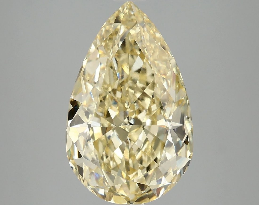 Loose Diamond - PEAR 5.02ct Fancy Vivid Yellow VS1: Loose Diamond - PEAR 5.02ct Fancy Vivid Yellow VS1 Source: This is a real non-mined Diamond that has been grown in a lab Shape: PEAR Carats: 5.02 Color: Fancy Vivid Yellow Certification: IGI Video: