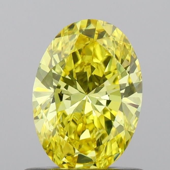 Loose Diamond - OVAL 0.65ct Fancy Vivid Yellow VS2: Loose Diamond - OVAL 0.65ct Fancy Vivid Yellow VS2 Source: This is a real non-mined Diamond that has been grown in a lab Shape: OVAL Carats: 0.65 Color: Fancy Vivid Yellow Certification: IGI Video: