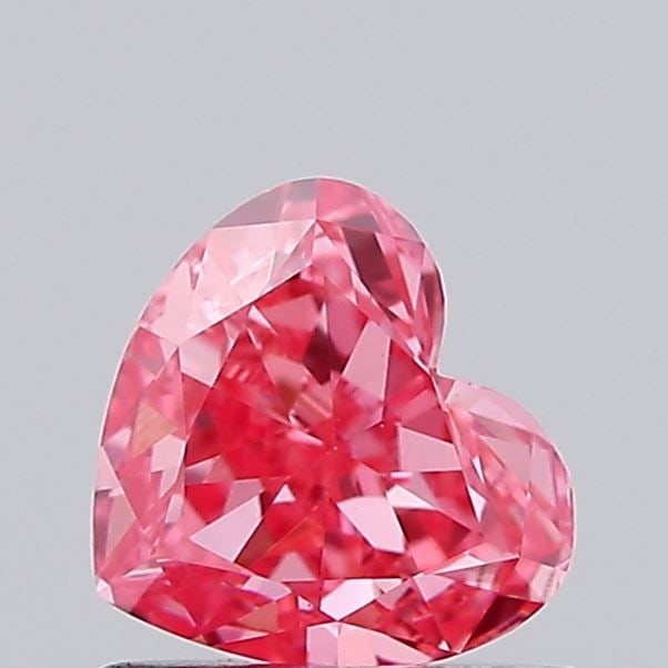 Loose Diamond - HEART 0.83ct Fancy Vivid Pink VS1: Loose Diamond - HEART 0.83ct Fancy Vivid Pink VS1 Source: This is a real non-mined Diamond that has been grown in a lab Shape: HEART Carats: 0.83 Color: Fancy Vivid Pink Certification: IGI Video: