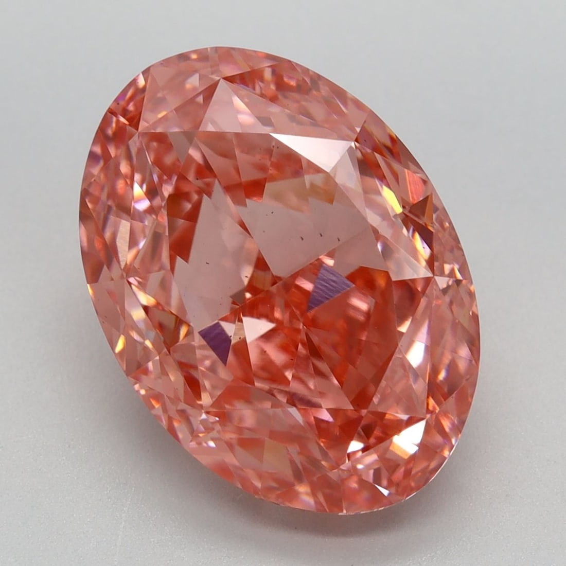 Loose Diamond - OVAL 6.53ct Fancy Vivid Pink VS2: Loose Diamond - OVAL 6.53ct Fancy Vivid Pink VS2 Source: This is a real non-mined Diamond that has been grown in a lab Shape: OVAL Carats: 6.53 Color: Fancy Vivid Pink Certification: IGI Video: