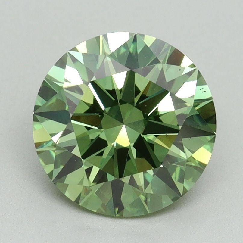 Ideal Loose Diamond - ROUND 2.01ct Fancy Vivid Green VS2: Ideal Loose Diamond - ROUND 2.01ct Fancy Vivid Green VS2 Source: This is a real non-mined Diamond that has been grown in a lab Shape: ROUND Carats: 2.01 Color: Fancy Vivid Green Certification: IGI Vid