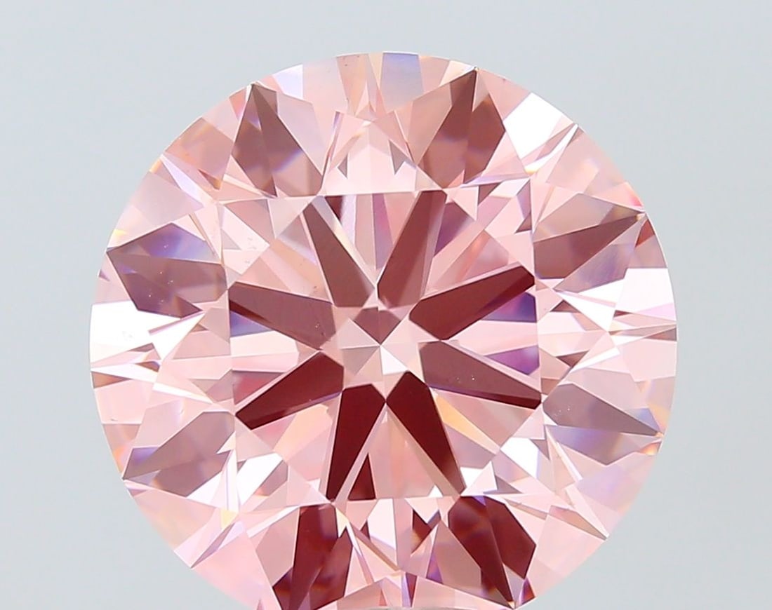 Ideal Loose Diamond - ROUND 14.1ct Fancy Vivid Pink VS1: Ideal Loose Diamond - ROUND 14.1ct Fancy Vivid Pink VS1 Source: This is a real non-mined Diamond that has been grown in a lab Shape: ROUND Carats: 14.1 Color: Fancy Vivid Pink Certification: IGI PLEAS