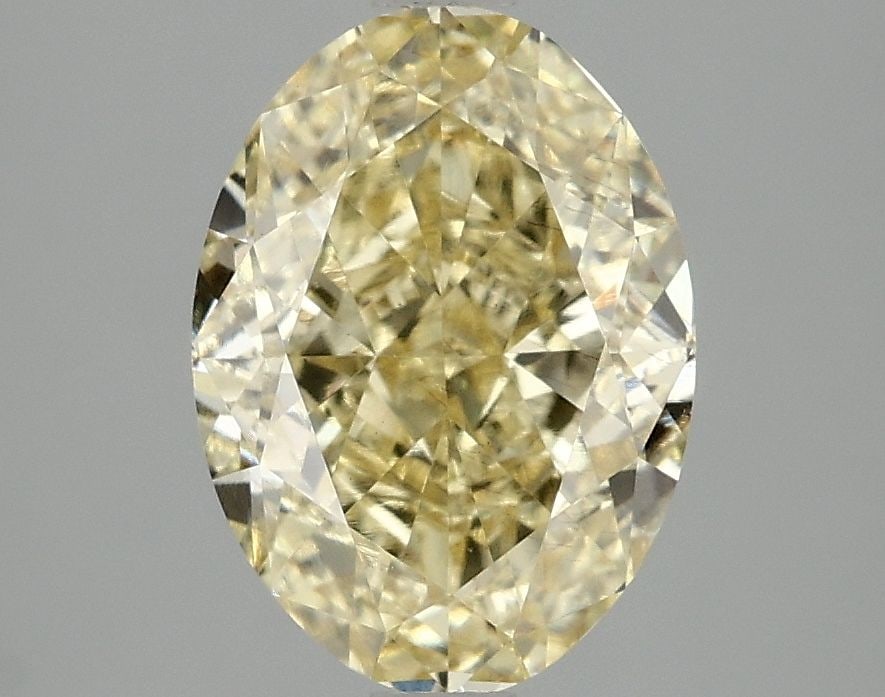 Loose Diamond - OVAL 3.02ct Fancy Vivid Yellow VS2: Loose Diamond - OVAL 3.02ct Fancy Vivid Yellow VS2 Source: This is a real non-mined Diamond that has been grown in a lab Shape: OVAL Carats: 3.02 Color: Fancy Vivid Yellow Certification: IGI Video: